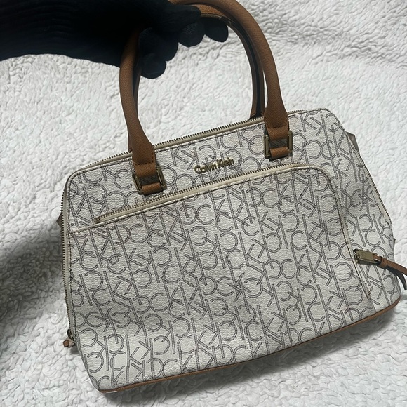 Calvin Klein Handbags - Calvin Klein Monogram Cream and Tan Satchel
